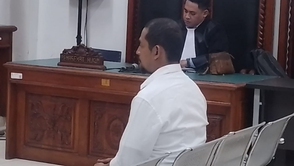 Fajar Widyadharma saat mengikuti sidang